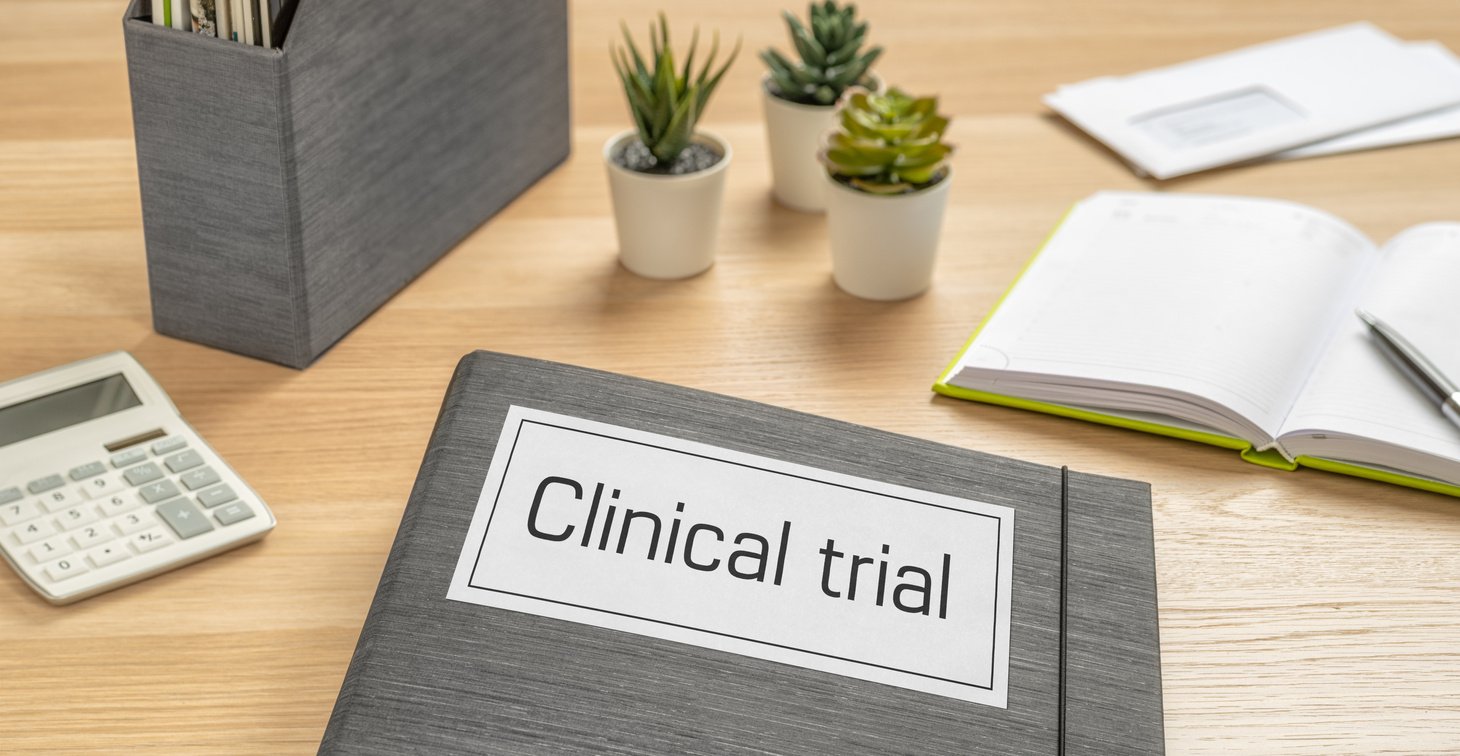 A Folder on a Desk with the Label Clinical Trial